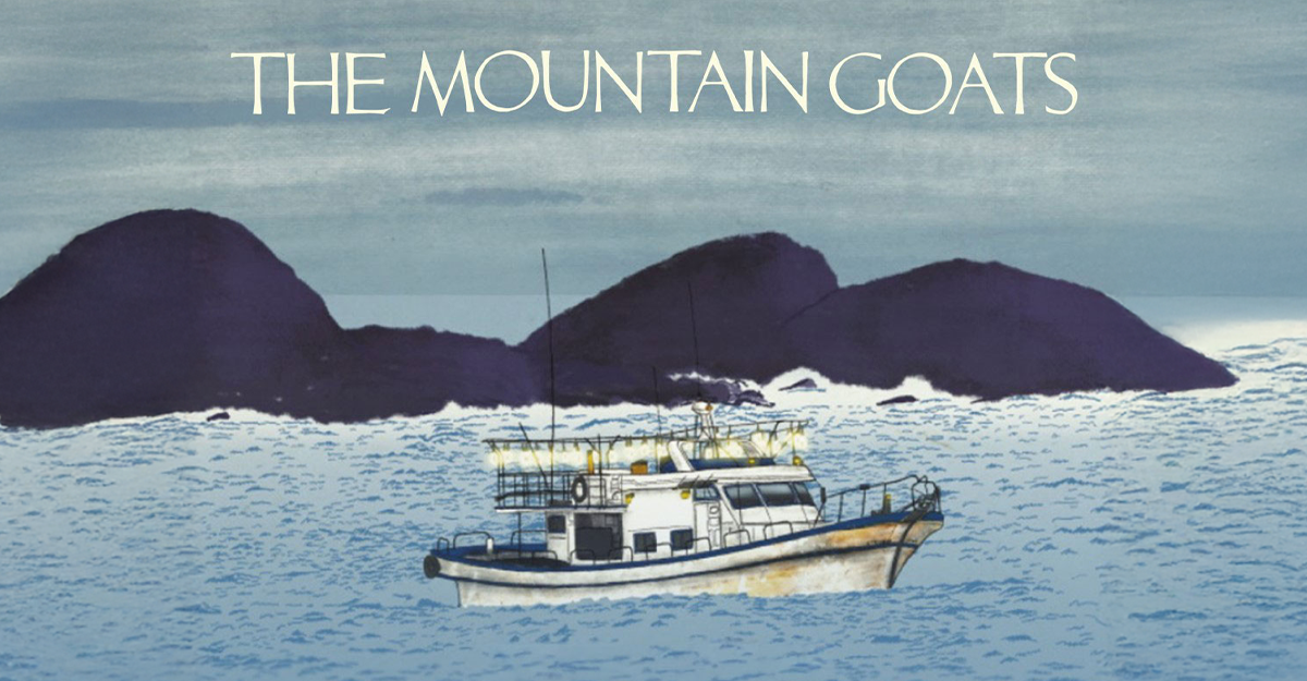 Ein Boot auf einem blauen Meer vor einer Bergkulisse mit dem Schriftzug 'The Mountain Goats'.