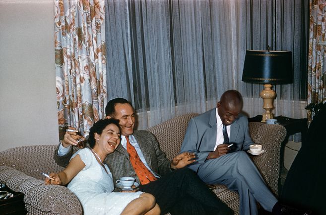 Photograph by Lee Shulman and Omar Victor Diop, The Anonymous Project presents “Being There”, 2023, people sitting on a couch