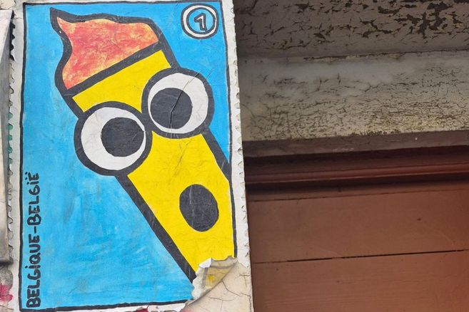 A paste-up of a single French fry with eyes, looking surprised.