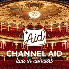 Innenansicht eines prunkvollen Konzertsaals mit dem Schriftzug 'Channel Aid live in concert'.