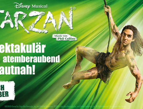 Werbung für Disneys Musical Tarzan mit einem Darsteller, der an einem Seil schwingt.