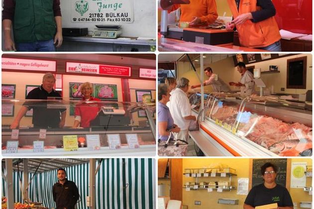 Marktbeschicker bieten ihre Waren an verschiedenen Ständen an.