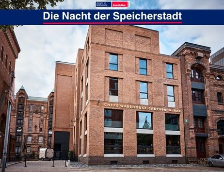 Backsteingebäude in der Speicherstadt mit der Aufschrift 'Chefs Warehouse Canteen & Bar'.