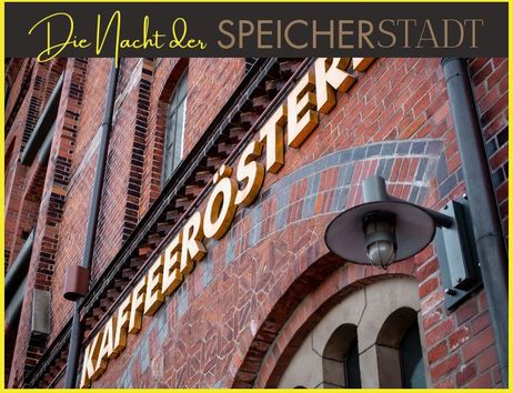 Fassade der Speicherstadt Kaffeerösterei mit gelbem Schriftzug und Backsteinmauer.