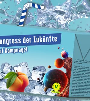 Beverage carton with straw, surrounded by water splashes, with text ‘Congress of Futures at Kampnagel’ and fruit on the front.