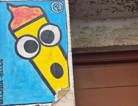 A paste-up of a single French fry with eyes, looking surprised.